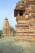 Khajuraho - Lakshmana temple and one of the small auxiliary temples 